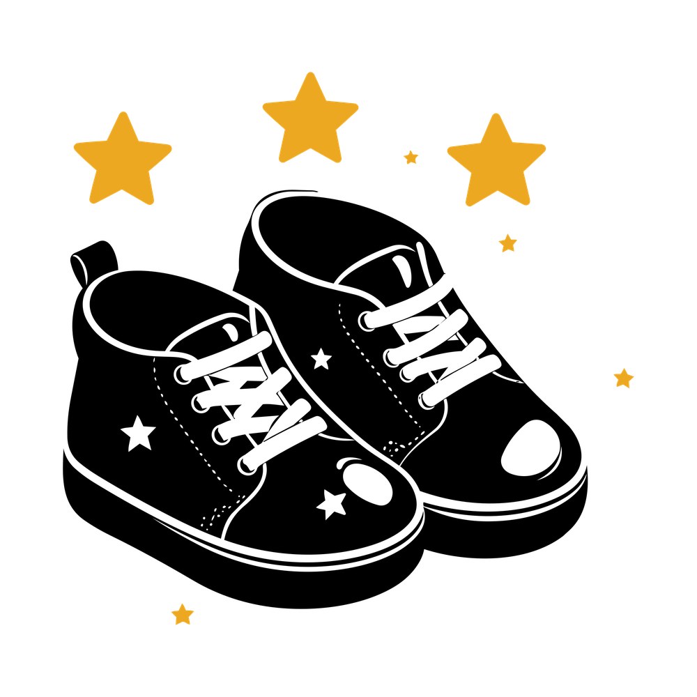 Pair of black baby sneakers with white laces surrounded by gold five-point stars